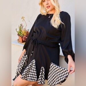 Elegant Black and WhitBubble Sleeve Gingham Ruffle Romper With Checkered Accents